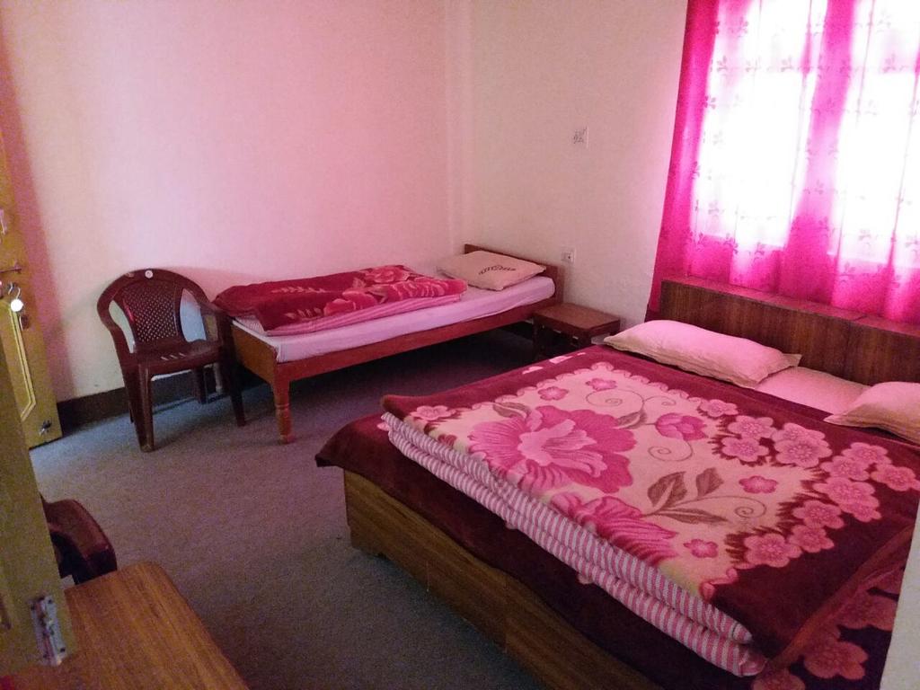 Nanda Devi Hotel room